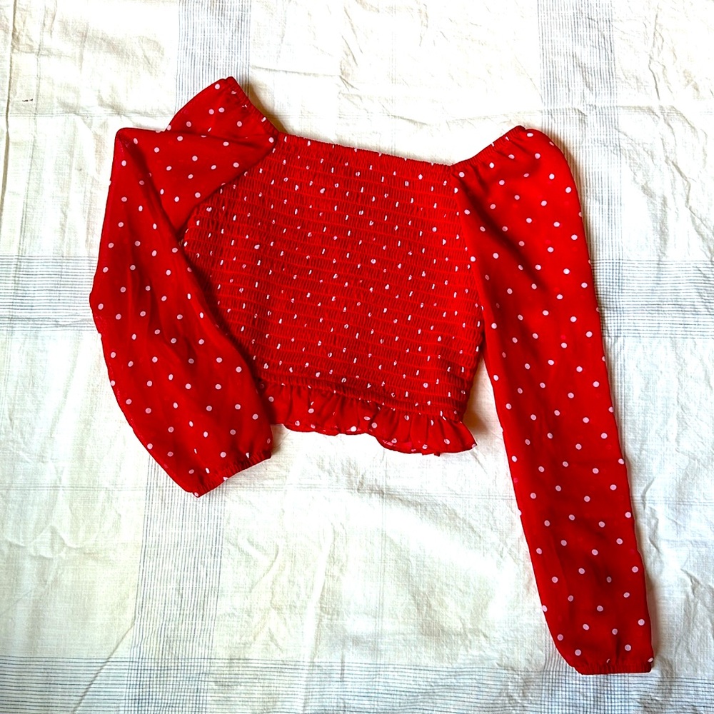 Red polka dot blouse with shirred bodice